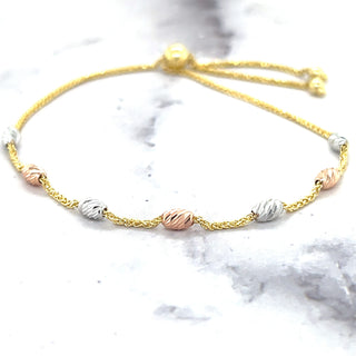 14K Tri-color Gold 9.25" Stationed DC Oval Beads Friendship Bracelet